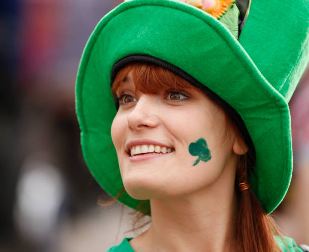 istock A young woman, in a green hat, celebrating St Patrick's Day 166322766