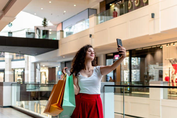 istock Young woman's shopping mall adventure immortalized in a selfie 1663240492