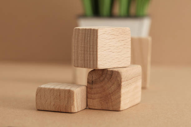 istock Wooden eco platform podium on beige background. Minimal empty display product presentation scene. 1663256720