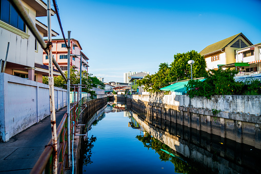 Canal drains into the sea at Ban Naklua, Pattaya, Thailand.