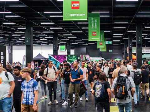 COLOGNE - AUG 26, 2023: Crowds of Visitors in Hall at Gamescom 2023 in Cologne
