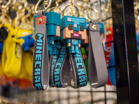 COLOGNE - AUG 26, 2023: Iconic Minecraft Keychains. Must-Have Fan Store Merchandise