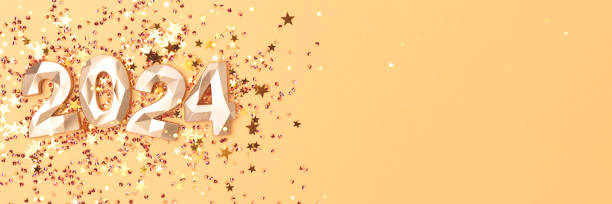 istock Banner with 2024 numbers and glittering stars confetti on a golden background. 1663295991