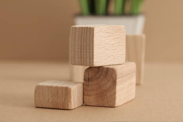 istock Wooden eco rustic platform podium on beige background. Minimal empty display product presentation scene. 1663297100