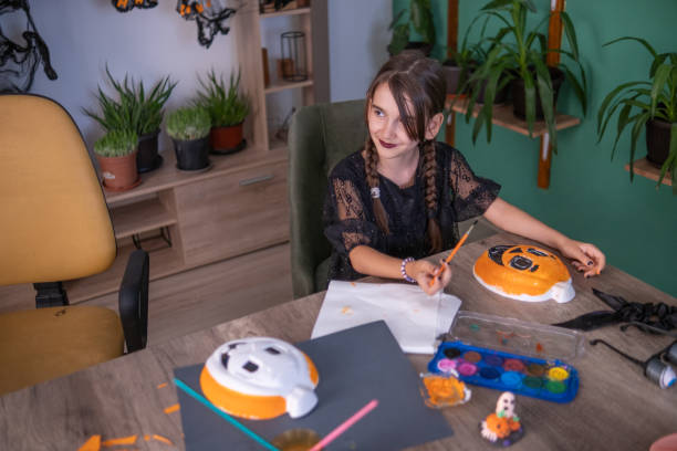 istock Decorating the house with spooky Halloween decorations 1663301499
