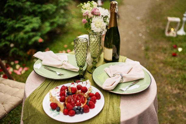 istock Festive table with wine, cake and fruit. Festive event. Romantic dinner. 1663317216