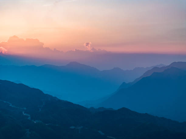 istock Beautiful sunrise with wind power on the mountain 1663330091