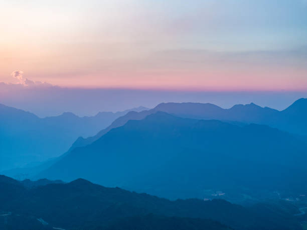 istock Beautiful sunrise with wind power on the mountain 1663330208