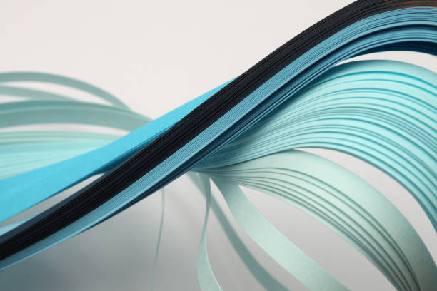istock Abstract blue (turquoise) color strip wave paper line background. 1663340049