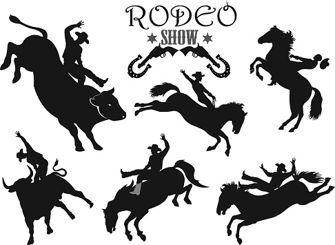 Man riding bucking bronco in rodeo wild west