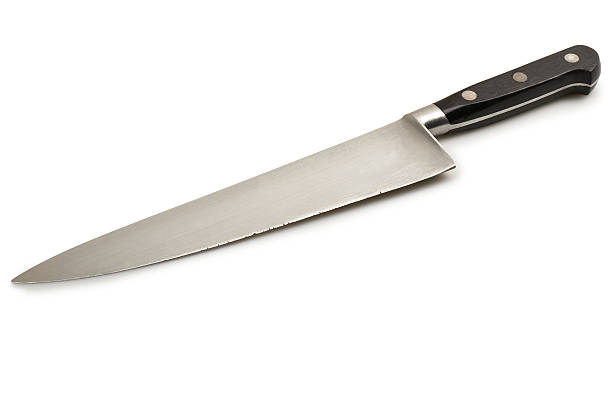 istock close up of a used knife on white background 166334926