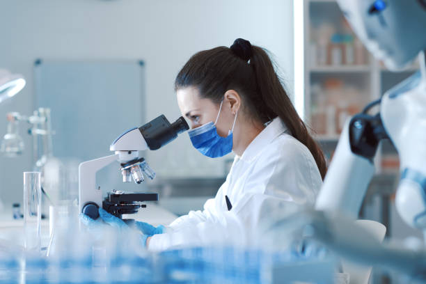 istock Scientist and humanoid AI robot in the science lab 1663374966