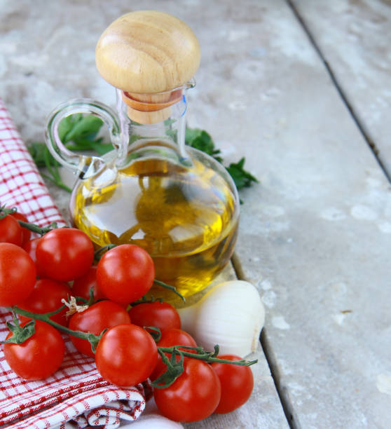 istock fresh organic tomatoes and basil on wooden background 1663379806
