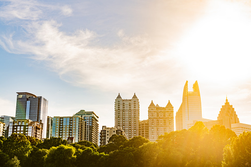 This is a photograph of the downtown skyline view from Piedmont Park in Atlanta, Georgia during summer.