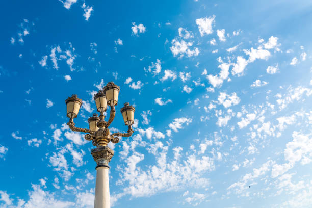 Street lamp against the blue sky