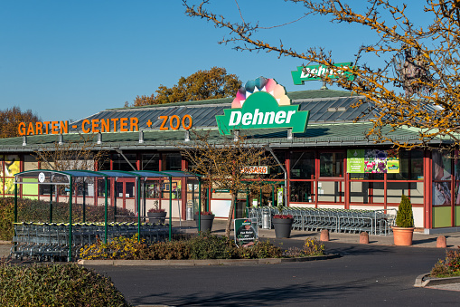 Amberg, Germany - November 13, 2022: Store of the garden and pet supplies chain Dehner in the german town Amberg. Wholesale and retail. Headquarter in the town Rain am Lech , Swabia, Bavaria. Sunny day with blue sky.