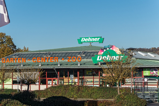 Amberg, Germany - November 13, 2022: Store of the garden and pet supplies chain Dehner in the german town Amberg. Wholesale and retail. Headquarter in the town Rain am Lech , Swabia, Bavaria. Sunny day with blue sky.