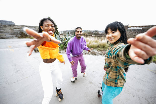 istock Candid gesturing portrait of roller skaters in winter 1663446054