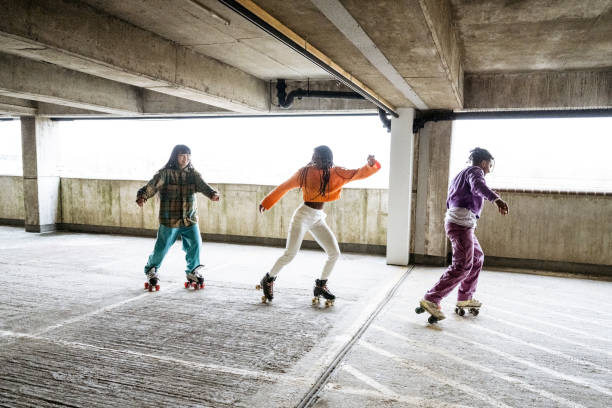 istock Roller skaters following each other through urban garage 1663446275