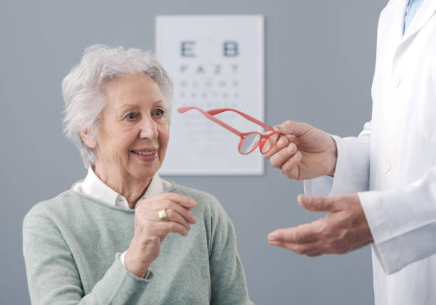 istock Senior woman having an eye test and trying new glasses 1663457096