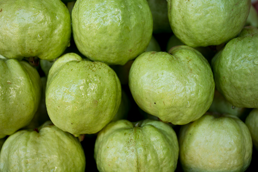 Guava is one of the most common Thai fruits you'll find on the street. It has about the same size as an apple with light green skin, white pulp and thousands of seeds inside..