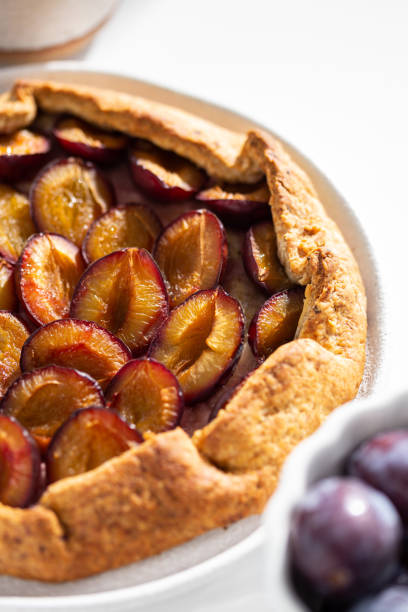 istock Freshly baked pie with plums. sweet galette 1663493827