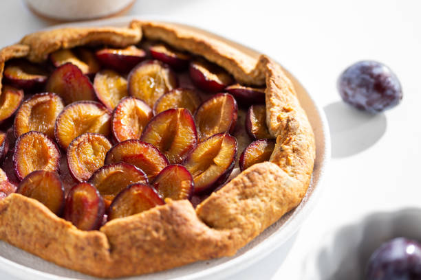 istock Freshly baked pie with plums. sweet galette 1663495823