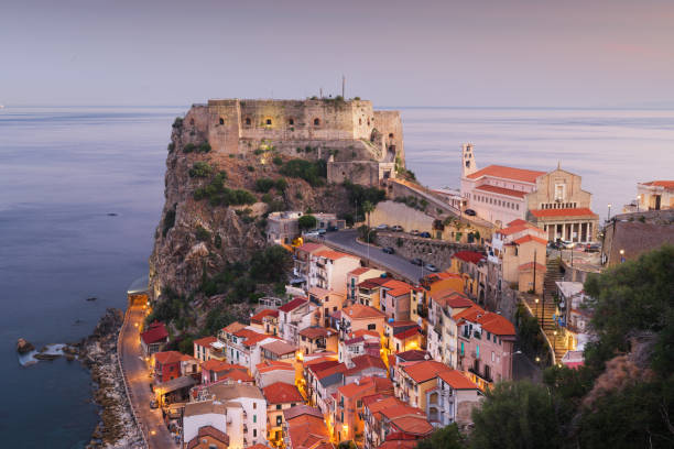 Scilla, Italy on the Mediterranean Sea Scilla, Italy on the Mediterranean coast at dawn. castle scilla stock pictures, royalty-free photos & images