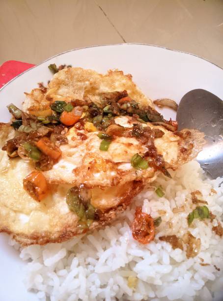 istock An white rice and delicious omelette with ketchup 1663510073