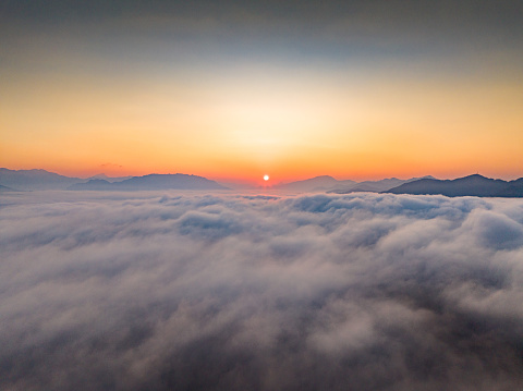 Aerial photography of beautiful sunrise and sea of clouds on the mountain