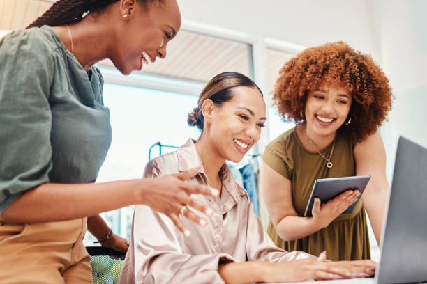 istock Employees, teamwork and planning on tech in office with creative, ideas for digital marketing strategy on computer or tablet. Online, advertising and women in Colombia working together in startup 1663526382