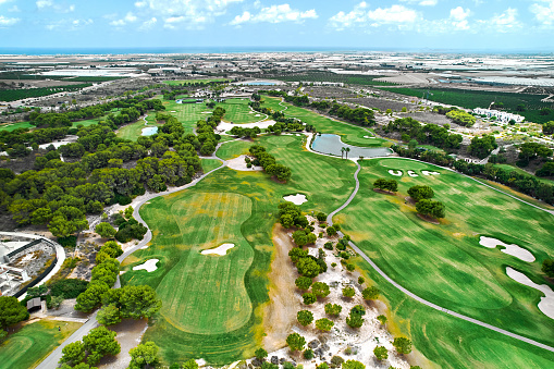 golf course with bay of water