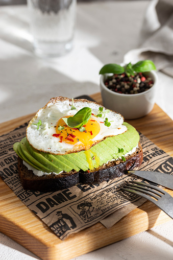 Delisious toasted bread with avocado and eggs