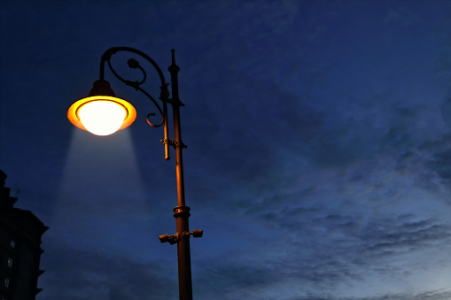 street lights on high steel pillars and blue sky