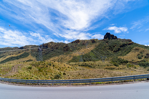 Panoramic landscape with paramos and cold mountains and sky, white clouds