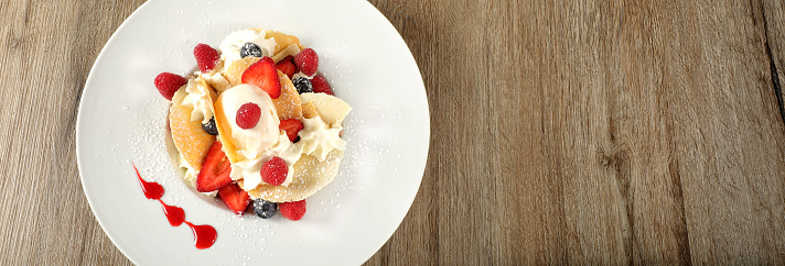 Close up Brigidini Dessert with mix berry fruits