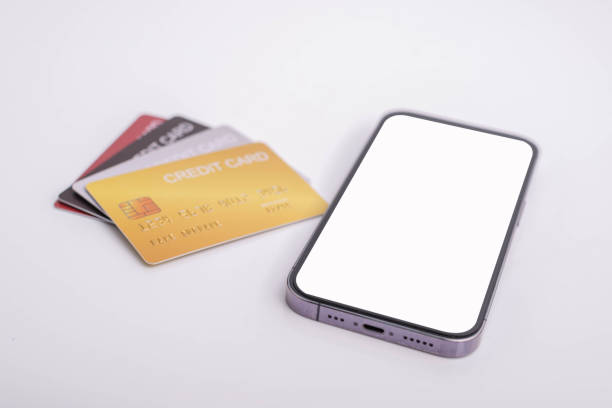istock Credit card and mobile phone placed on white background 1663674698