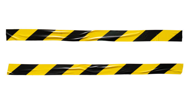 istock Yellow and black barricade tape 1663687748