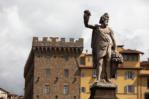 Sculptures on Ponte Santa Trinita bridge in Florence, Italy