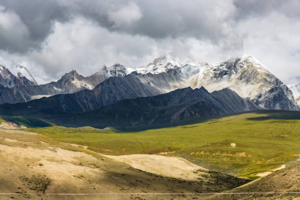 istock Dark Clouds HImalayan Mountains and Road to Korala Border between Tibet China and Upper Mustang, Nepal 1663729349