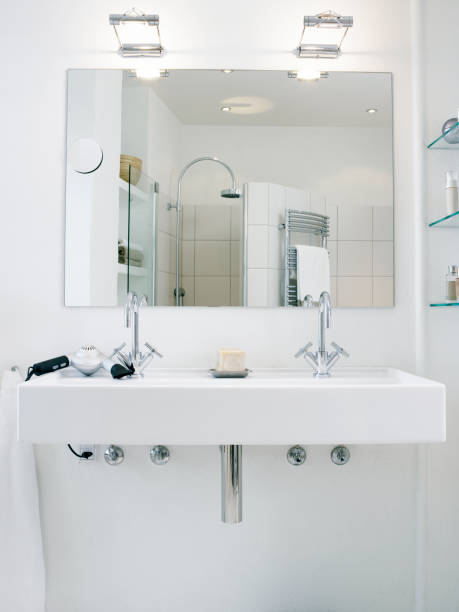istock Washbasin with two faucets 166373259