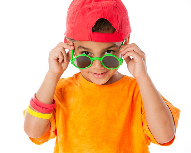 istock Real People: Mixed Race Little Boy Baseball Cap Silly Sunglasses 166374682
