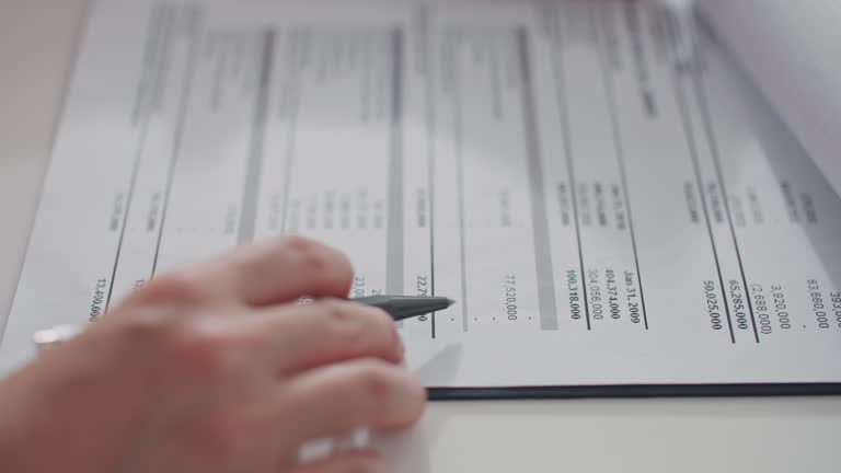 Businesswoman Checking Business finance investment Financial Report