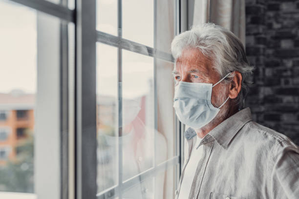 istock Thoughtful depressed old man looking out of window with hope, thinking over business lockdown loss, future vision after epidemic quarantine, coronavirus pandemic, feeling doubt, uncertain 1663756214