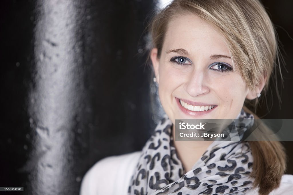 Real People: Smiling Caucasian Teenage Girl Head and Shoulders A head and shoulders image of a smiling caucasian teenage girl.  16-17 Years Stock Photo