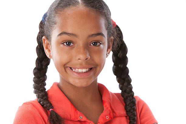 istock Real People: Smiling Black Little Girl Braids Closeup Head Shoulders 166375995