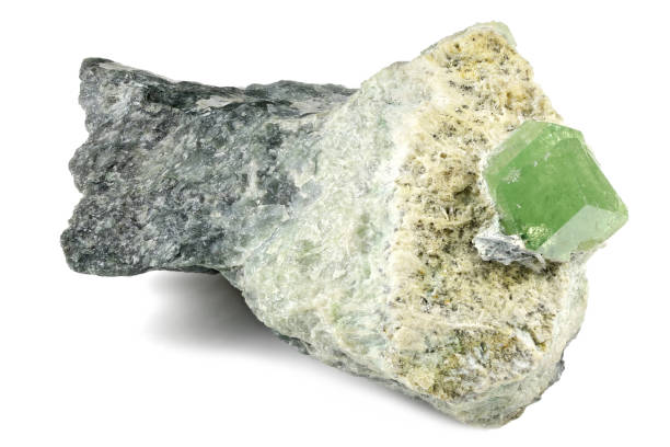 green garnet on matrix from Khost, Afghanistan green garnet on matrix from Khost, Afghanistan isolated on white background khost afghanistan stock pictures, royalty-free photos & images
