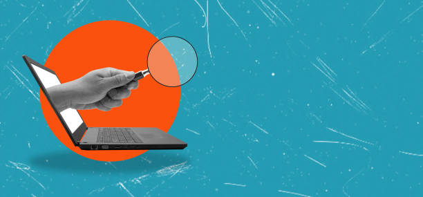 istock Internet search, computer search, hand out of computer with magnifying glass. 1663763758