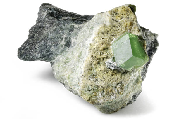 green garnet on matrix from Khost, Afghanistan green garnet on matrix from Khost, Afghanistan isolated on white background khost afghanistan stock pictures, royalty-free photos & images