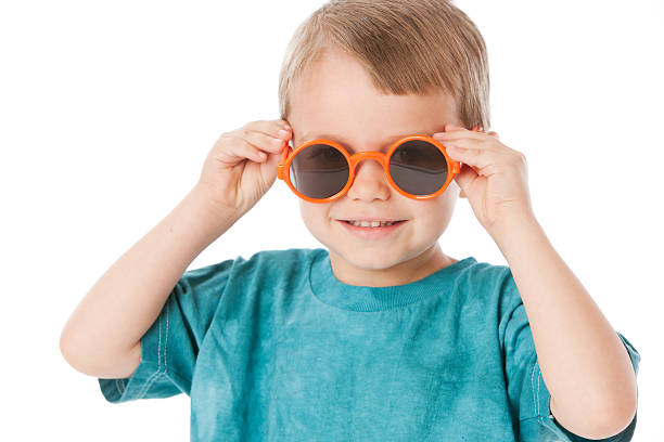 istock Real People: Caucasian Little Boy Wearing Silly Sunglasses Head Shoulders 166378357